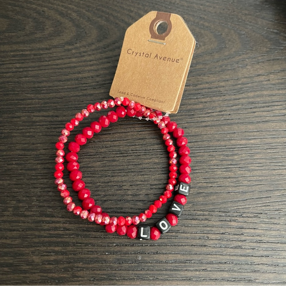 TWO RED BEADED CRYSTAL STRETCH LOVE BRACELETS WITH BLACK AND WHITE LETTERING. - Picture 5 of 5